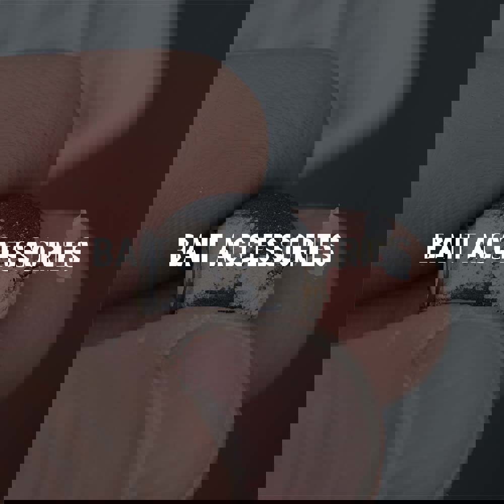 Fingers holding a bait